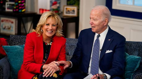 US President Joe Biden and first lady Jill Biden participate in NORAD Santa tracker phone calls in Washington, US, December 24, 2021.