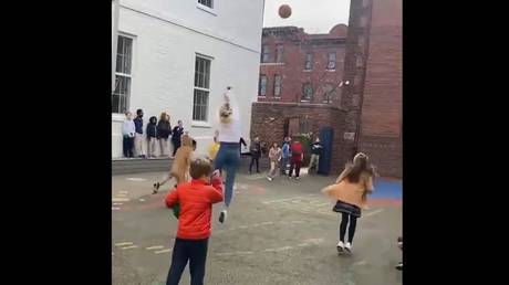 &lsquo;Sports clip of the year&rsquo;: Elementary school teacher sinks incredible long-range basketball shot (VIDEO)