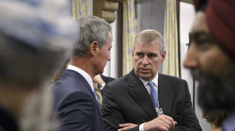 Prince Andrew speaks to business leaders during a reception on the sidelines of the World Economic Forum in Davos