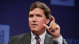 Tucker Carlson bursts out in 