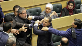 Lawmakers throw haymakers in parliament (VIDEOS)