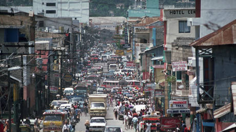 FILE PHOTO: A view down a busy street in Port au Prince, Haiti.