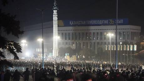 Riot police block protesters in the center of Almaty, Kazakhstan, January 5, 2022