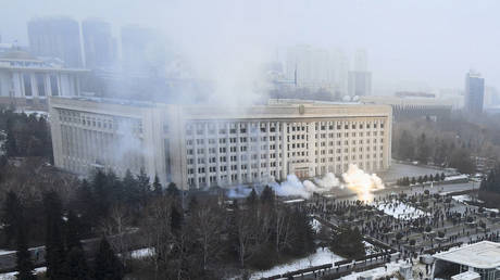 Smoke rises from the city hall building during a protest in Almaty, Kazakhstan on January 5, 2022.