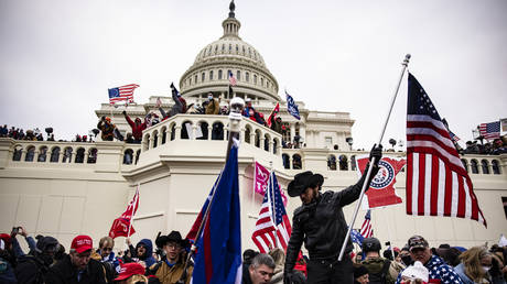 FILE PHOTO. Pro-Trump supporters storm the U.S. Capitol following a rally with President Donald Trump on January 6, 2021 in Washington, DC. © Getty Images / Samuel Corum