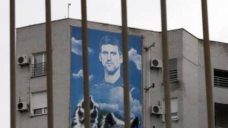A billboard depicting Serbian tennis player Novak Djokovic on a building in Belgrade, Serbia, Thursday, Jan. 6, 2022