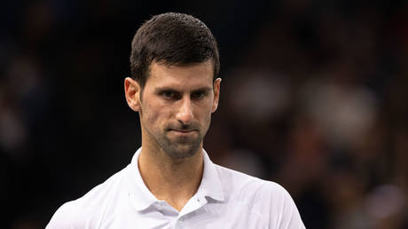 Novak Djokovic is facing more questions regarding his entry into Australia. © DeFodi Images via Getty Images