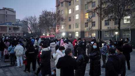 Residents stand in line to take Covid test in Anyang, China, January 8, 2022