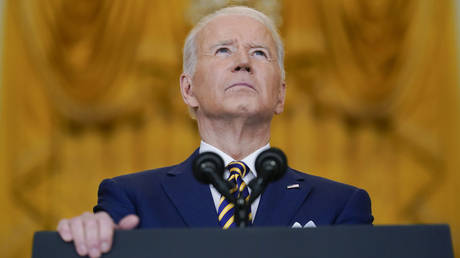 President Joe Biden pauses as he speaks during a news conference in the White House in Washington, DC, Wednesday, January, 19, 2022.