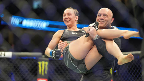 UFC fighter jumps into Rogan&rsquo;s arms after quitting stripping for MMA (VIDEO)