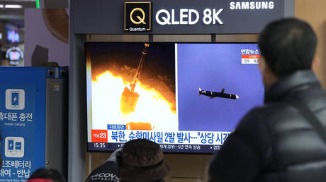 FILE PHOTO: People watch a TV showing file images of North Korea's missile launch during a news program at the Seoul Railway Station in Seoul, South Korea, Tuesday, Jan. 25, 2022. © AP Photo/Ahn Young-joon