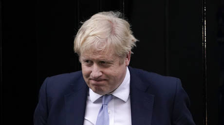 Britain's Prime Minister Boris Johnson leaves 10 Downing Street as he makes his way to the House of Commons, in London, Monday, Jan. 31, 2022 © AP Photo/Alberto Pezzali