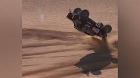Car flips 4 times in terrifying crash at Dakar Rally (VIDEO)