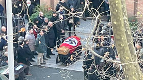 Католическая церковь возмущена гробом, накрытым нацистским флагом