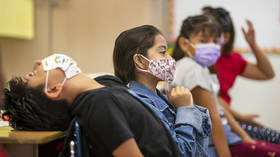 School children told cloth masks no longer good enough