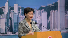 Hong Kong leader gives reason for not wearing mask