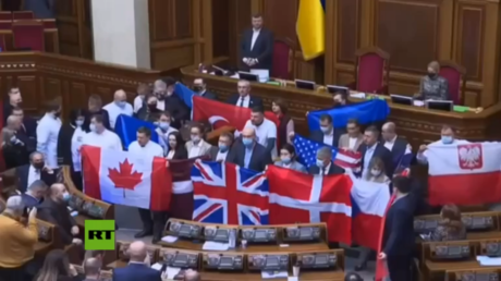 In the Rada, deputies from different factions came to the podium with the flags of NATO countries in gratitude for the support of Ukraine and the supply of weapons.