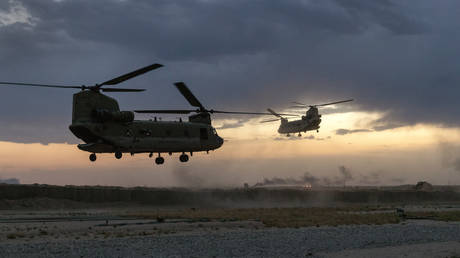 FILE PHOTO: CH-47 Chinook helicopters in northeastern Syria. John Moore/Getty Images