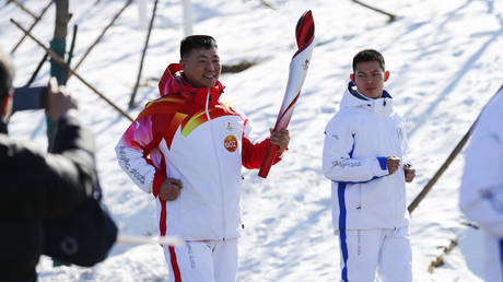 Qi Fabao was part of the torch relay. © Zhao Juan / China News Service via Getty Images
