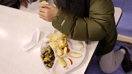 A student eats a vegan meal served for lunch at P.S. 124 The Yung Wing School on February 4, 2022, New York, US