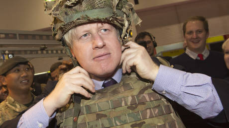 FILE PHOTO. Boris Johnson dresses up in a bullet-proof vest and a helmet. ©Bettina Strenske / LNP bia Global Look Press