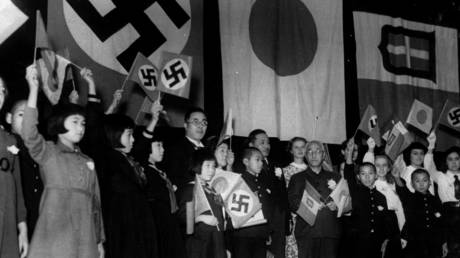 FILE PHOTO. Children of Japan, Germany, and Italy meet in Tokyo to celebrate the signing of the Tripartite Alliance between the three nations, December 17, 1940. © AP Photo