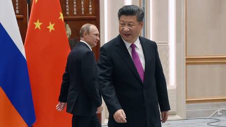 FILE PHOTO. Chinese President Xi Jinping (R) and Russian President Vladimir Putin (L). © Getty Images / Wang Zhou - Pool