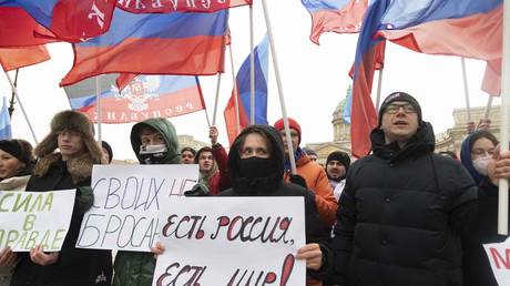 Demonstrators in St. Petersburg, Russia rally in support of Donetsk and Lugansk People’s Republics, February 23, 2022.