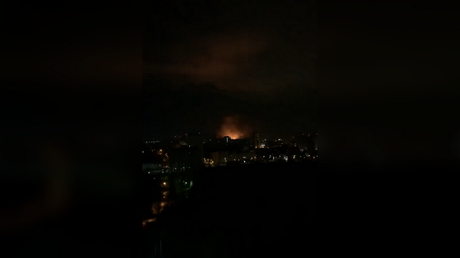 Videos posted online purport to show explosions hitting an area in north-west Kiev near a military base © BAZA