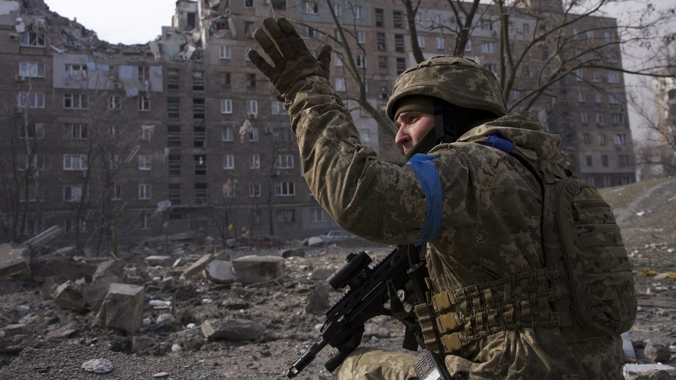 Civilians feared trapped and killed in theater explosion in Ukraine