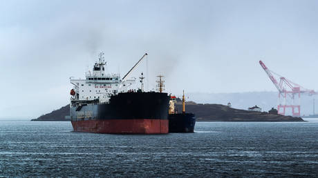 FILE PHOTO: An oil tanker is refueled in Halifax harbor, Nova Scotia, Canada.