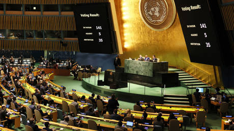 Voting results are shown on screens at a special session of the UN General Assembly on Wednesday in New York.