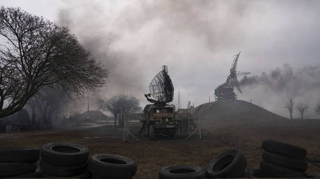 Smoke rise from an air defence base in the aftermath of a Russian strike in Mariupol, Ukraine, Feb. 24, 2022