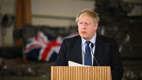 Britain's Prime Minister Boris Johnson speaks during a press conference at an airbase in Tallinn, Estonia on March 1, 2022.