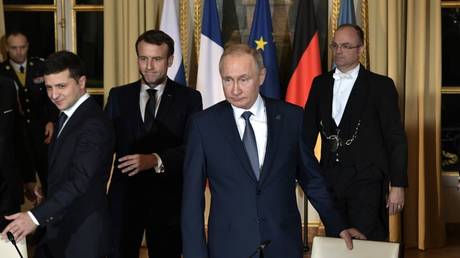 Volodymyr Zelensky, Emmanuel Macron and Vladimir Putin at the Elysee Palace in Paris, December 9, 2019.