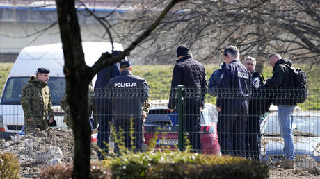 Police inspect site of a drone crash in Zagreb, Croatia, Friday, March 11, 2022.