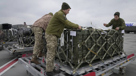 Ukrainian servicemen unpack military aid delivered as part of the US' security assistance to Ukraine, Boryspil airport, Ukraine, Feb. 11, 2022
