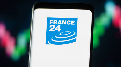 France24 logo displayed on a smartphone. © Mateusz Slodkowski / SOPA Images / LightRocket / Getty Images