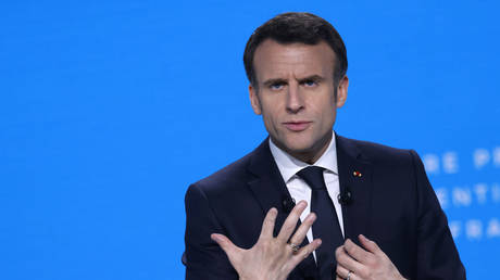 French leader Emmanuel Macron speaks during a press conference ahead of the first round of the presidential election – to be held on 10 April – in Paris, France, March 17, 2022