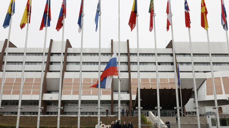 The Russian flag is removed outside the Council of Europe building, Wednesday, March 16, 2022 in Strasbourg. © AP Photo/Jean-Francois Badias