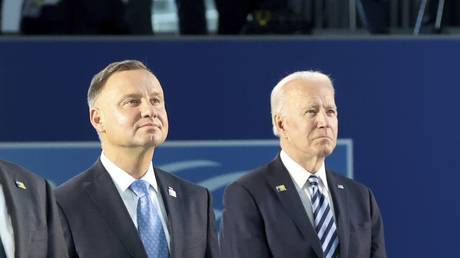 FILE PHOTO: Poland's President Andrzej Duda and US President Joe Biden pose during a group photo at a NATO summit in Brussels, June 14, 2021