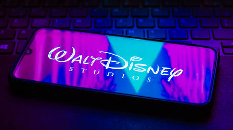 FILE PHOTO. The Walt Disney Studios logo seen displayed on a smartphone, October 07, 2021.