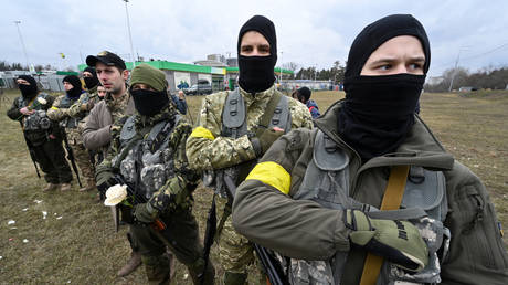 FILE PHOTO: Members of Ukrainian Territorial Defense Forces. © AFP / Felipe Dana
