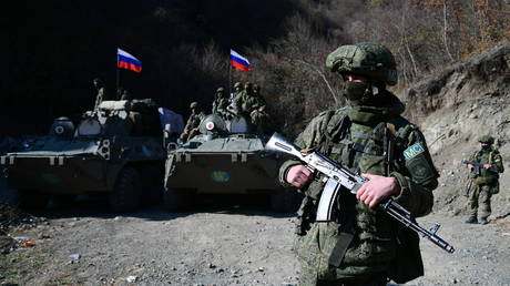 FILE PHOTO. A Russian peacekeeper holds a machine gun near the Dadivank Armenian monastery, in the self-proclaimed Nagorno-Karabakh Republic. © Sputnik/Maksim Blinov