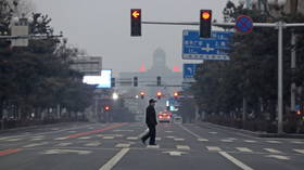 Огромный китайский город закрывается из-за Covid-19