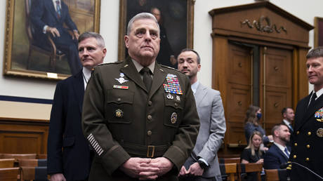 Chairman of the Joint Chiefs of Staff Gen. Mark Milley arrives for a House Armed Services Committee hearing on the fiscal year 2023 defense budget, Tuesday, April 5, 2022, in Washington.