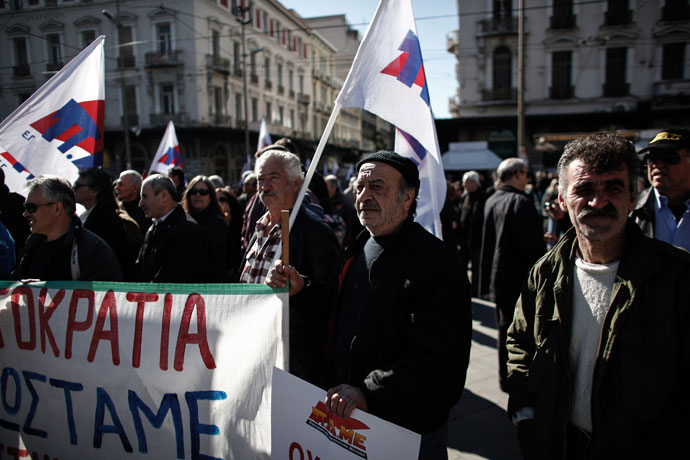 Members of a Greek Communist trade union demonstrate on February 20, 2013 in the center of Athens.(AFP Photo / Angelos Tzortzinis)