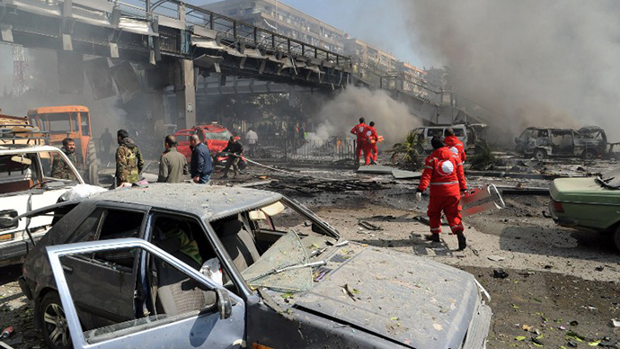 The aftermath of a powerful car bomb explosion near the headquarters of Syria's ruling Baath party in the centre of Damascus. (AFP Photo)