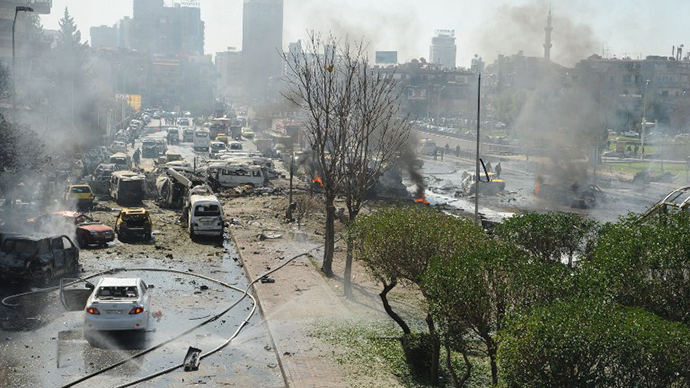 The aftermath of a powerful car bomb explosion near the headquarters of Syria's ruling Baath party in the centre of Damascus. (AFP Photo)