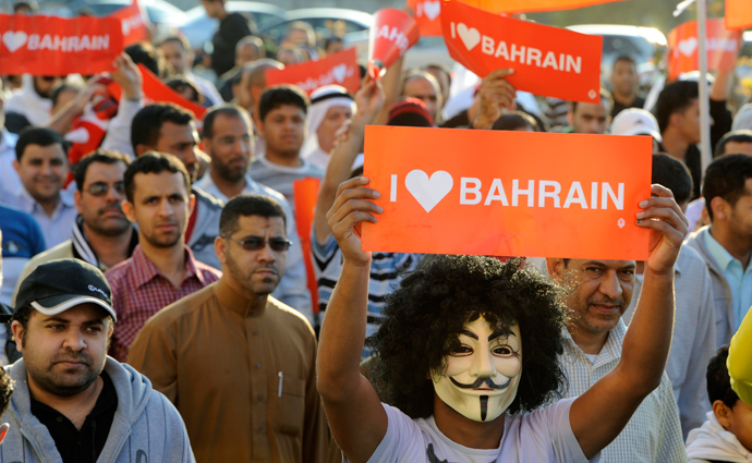 A protester wears a Guy Fawkes mask during an anti-government rally, organised by Bahrain's main opposition group Al Wefaq, in Salmabad, south of Manama February 5, 2013 (Reuters / Stringer)